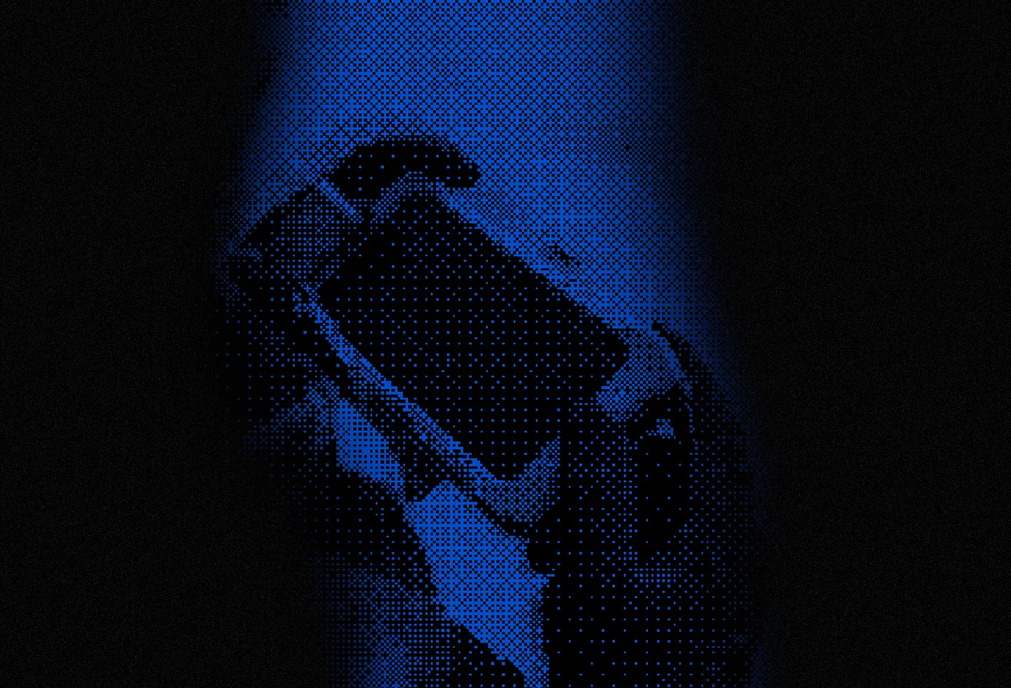 Hand holding a smartphone in a dark environment with a blue pixelated filter effect.